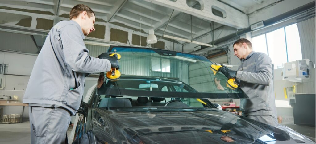 Windshield Replacement Mississauga - Expert Technicians Installing a Windshield