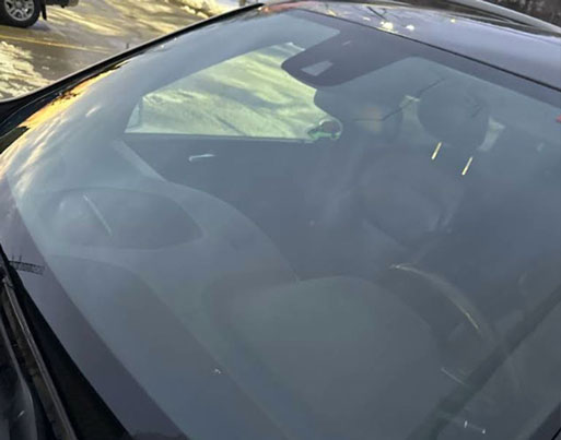 Autoglass Legend repairing front windshield chip in Oakville